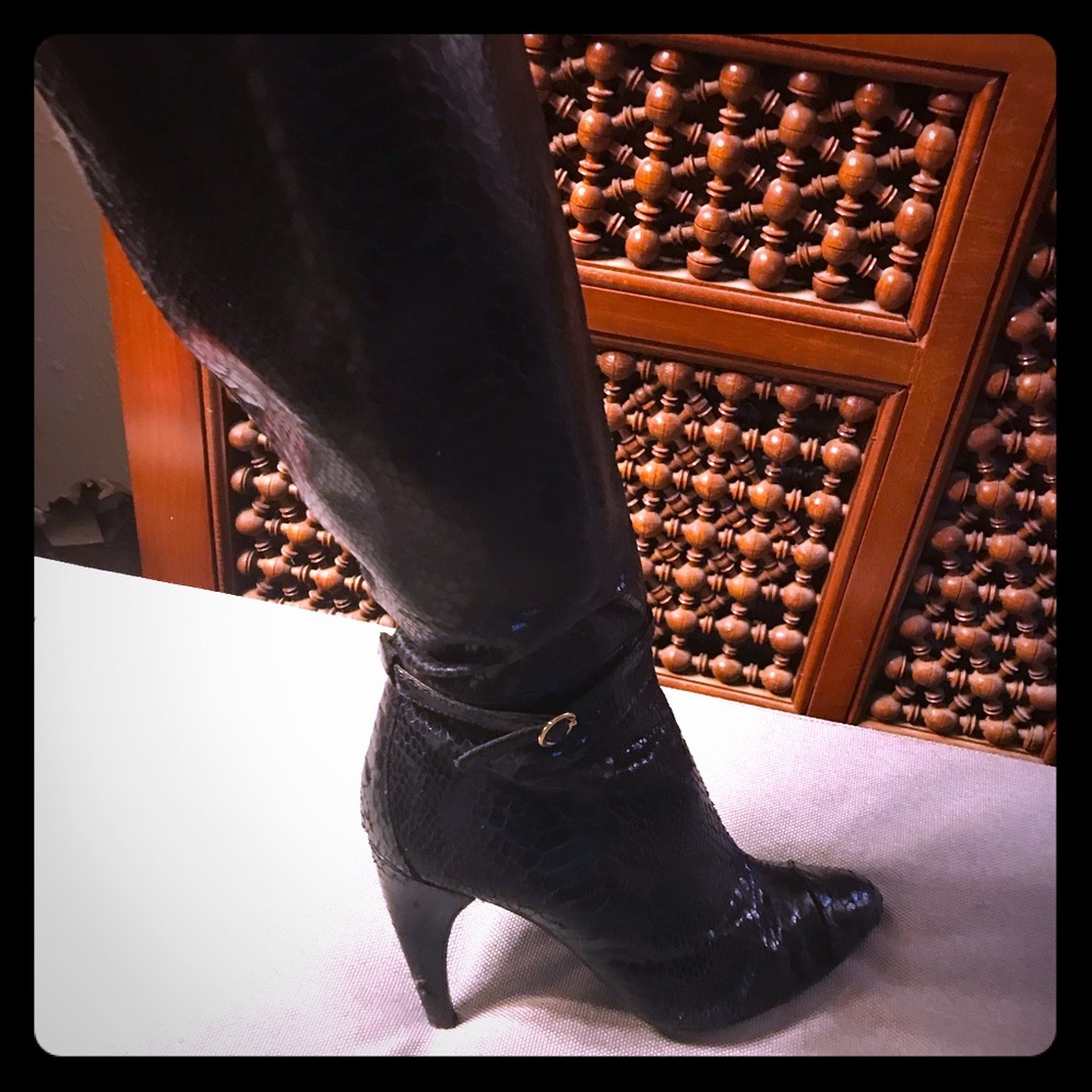 Black snakeskin knee high boots